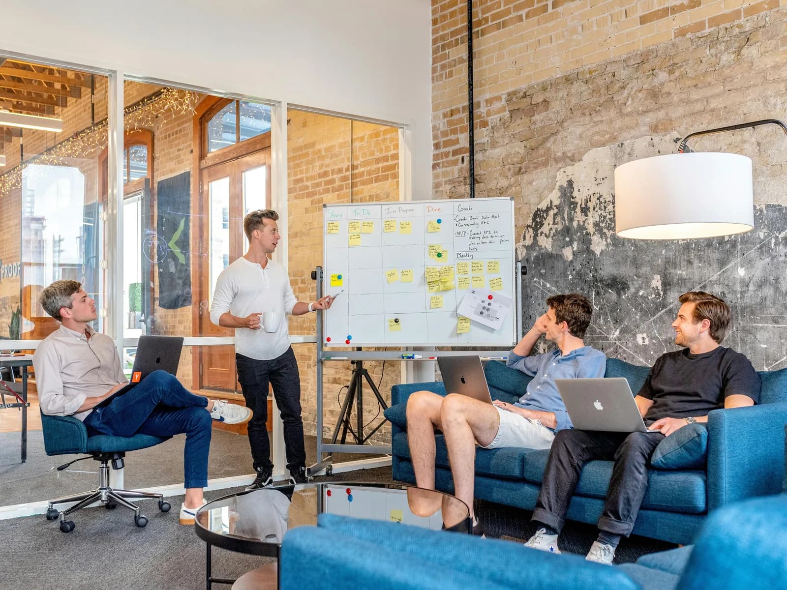 Startup founders collaborating in a creative workspace