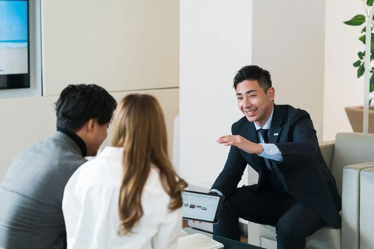 Real estate agent meeting clients in the office