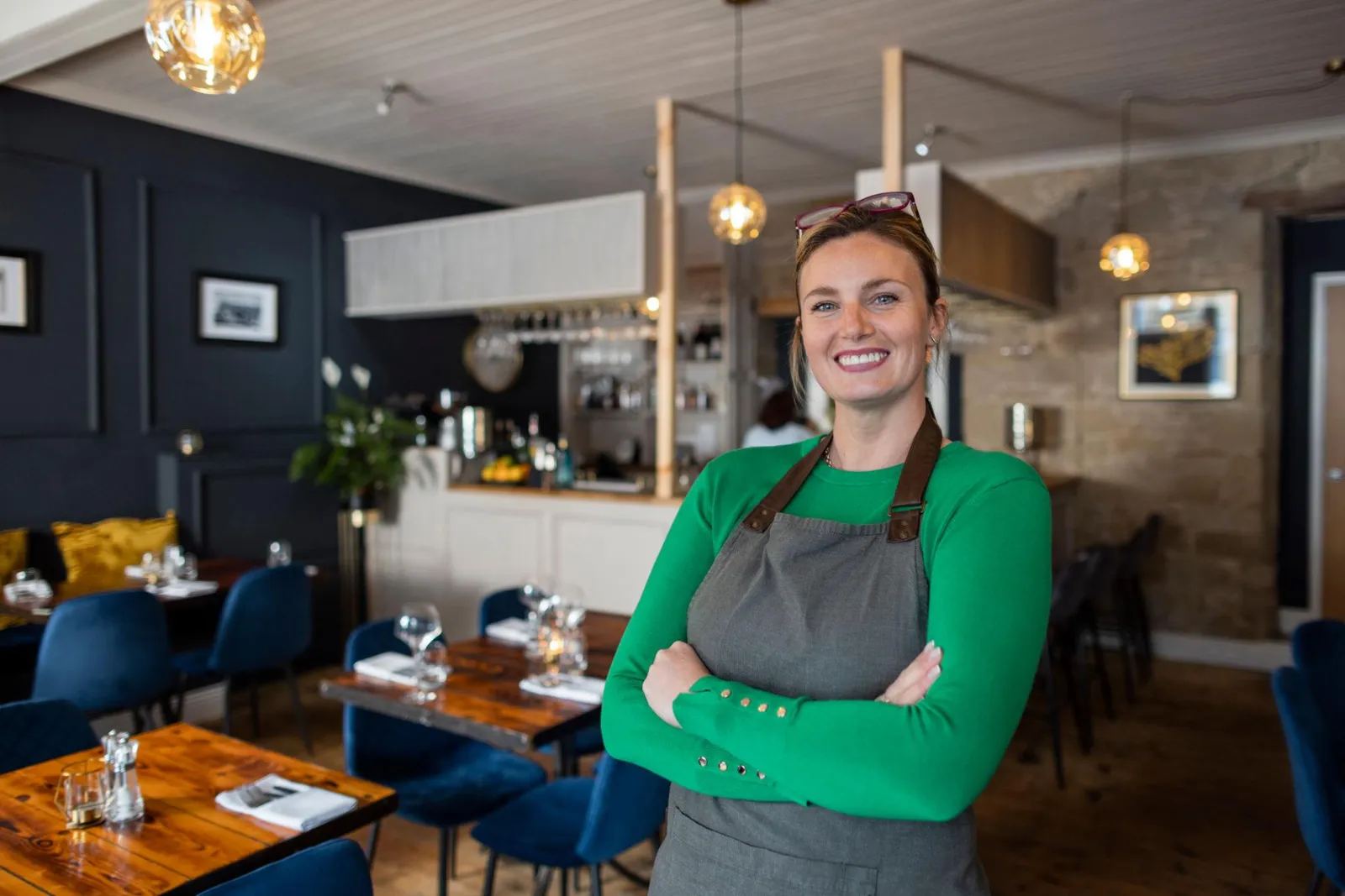 Restaurant manager standing in the dining room