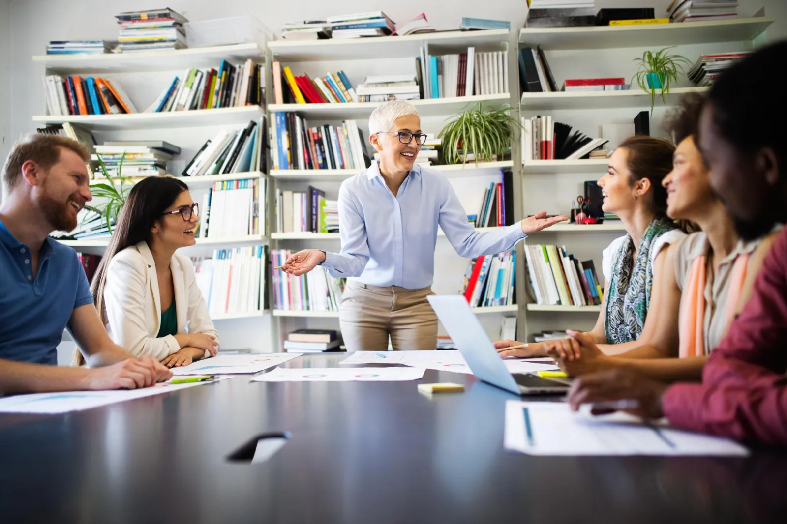 Business owners reviewing plan options in a conference room
