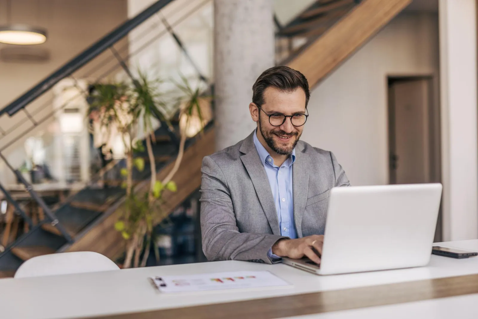 Small business owner working on a laptop